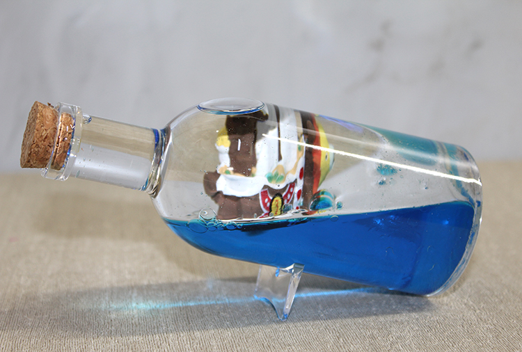 Sise Icinde Batmayan Gemi